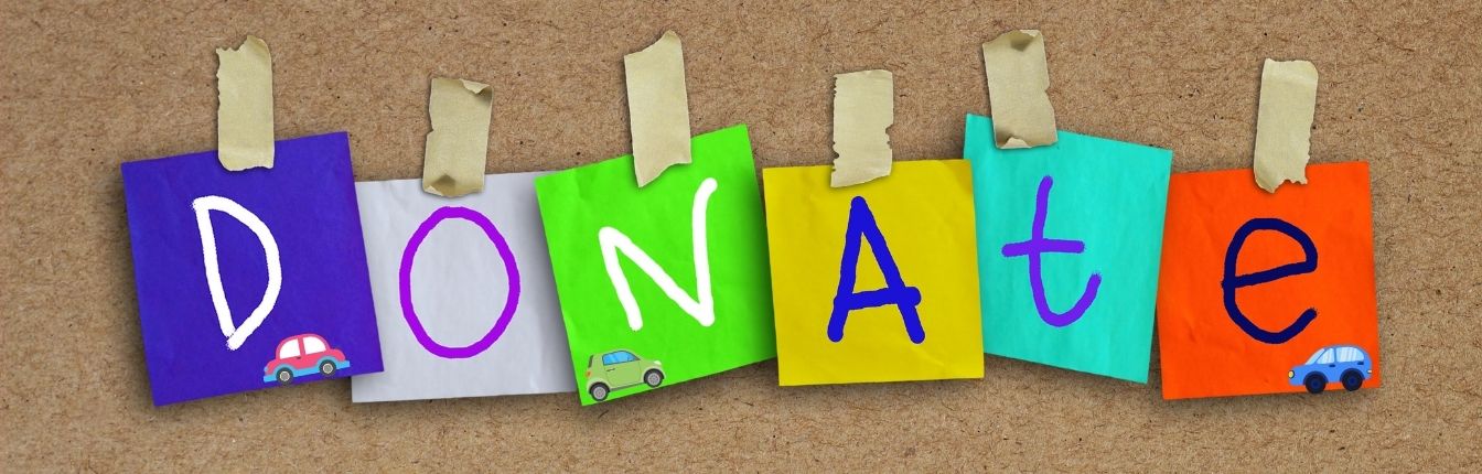 Sticky notes that spell DONATE in different colors. There are small cars on each note.